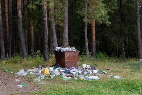 Recycle bin and garbage on ground landscape 스톡 사진