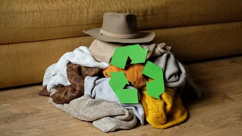 Recycle clothes concept. pile of old autumn clothes on the floor home Stock Footage 160247643