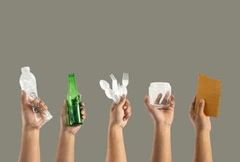 Recycle  different types of garbage Ecology concept holding garbage bottle pl Stock Photos