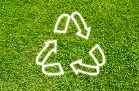 Recycle on green grass,  texture background Stock Illustration