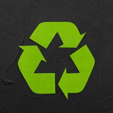 Recycle logo black plaster background Stock Photos