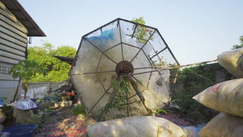 Recycle machine with stack of different types of large garbage dump, plastic  動画素材 168277994