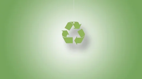 Recycle Symbol in Yellow Hanged with String On Green Background in 4K Resolution Stock Footage 125931093