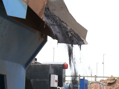 Recycle waste into skip side view Stock Footage 71148376