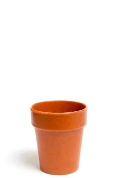 Recycled materials biodegradable tree pot isolated on a white background Stock Photos