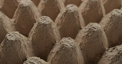 Recycled paper egg carton texture slow rotation.  Video stock 337256168