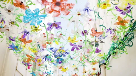 Recycled Plastic Bottles Made Into Colourful Hanging Decorations For Festiva Stock Footage 254833583