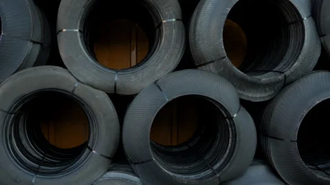 Recycled tire elements prepared for further processing in a manufacturing plant. Stock Footage 304472839