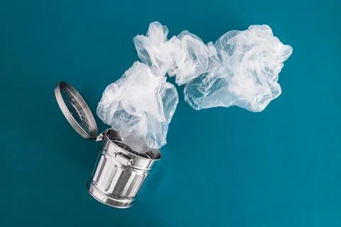 Recycling and avoiding landfill, open trash can with single use plastic bags  Stock Photos