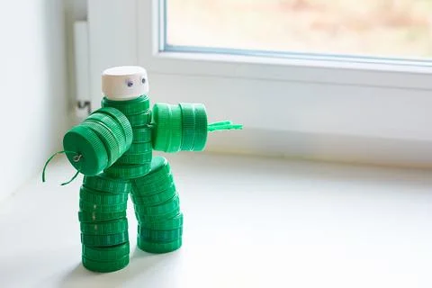 Recycling art. Zero waste, the second life of things. Toy robot made of plast Stock Photos