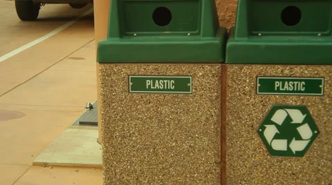 Recycling bins outside trash bin Stock Footage