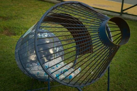 Recycling cage for plastic objects. Stock Photos