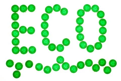 Recycling concept with Eco caption made of green plastic bottle caps Foto stock