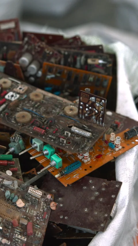 Recycling Electronic Components. Small Salvage Shop Focuses On Reclaiming Useful Stock Footage 347036562