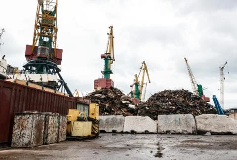 Recycling, loading scrap metal in the ship Stock Photos