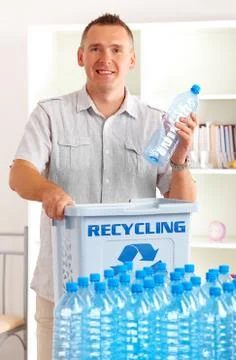 Recycling man with bottles Stock Photos