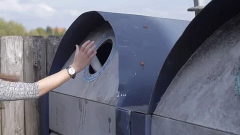 Recycling old cans in a german can-recycling container 動画素材 80562057