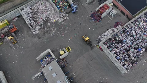Recycling plant processes plastic waste in industrial facility Video stock 337984588