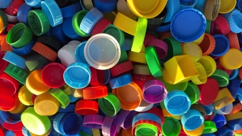 Recycling Plastic Bottle Caps. Plastic Material is Recyclable. Stock Footage 251747423