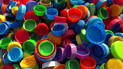 Recycling Plastic Bottle Caps. Plastic Material is Recyclable. Stock Footage 251747956