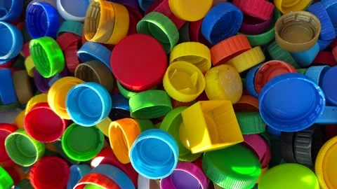 Recycling Plastic Bottle Caps. Plastic Material is Recyclable. Stock Footage 251749022