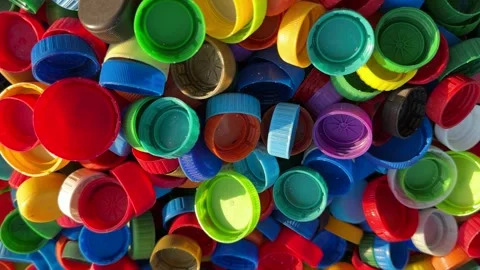 Recycling Plastic Bottle Caps. Plastic Material is Recyclable. Stock Footage 251756879