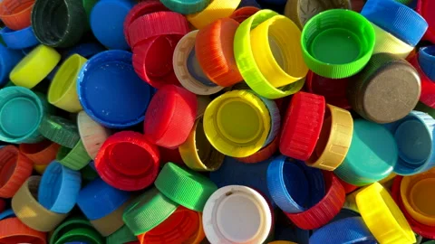 Recycling Plastic Bottle Caps. Plastic Material is Recyclable. Stock Footage 251916856