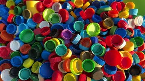 Recycling Plastic Bottle Caps. Plastic Material is Recyclable. Stock Footage 251916926