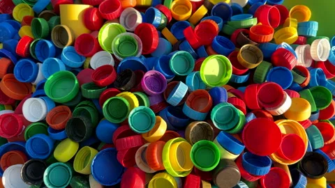 Recycling Plastic Bottle Caps. Plastic Material is Recyclable. Stock Footage 251917022