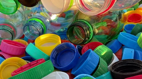 Recycling Plastic Bottle Caps. Plastic Material is Recyclable. Stock Footage 251952257