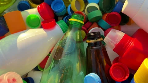 Recycling Plastic Bottle Caps. Plastic Material is Recyclable. Stock Footage 251952304