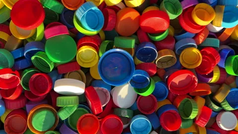 Recycling Plastic Bottle Caps. Plastic Material is Recyclable. Stock Footage 251952330