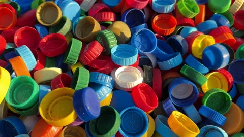 Recycling Plastic Bottle Caps. Plastic Material is Recyclable. 库存影片 252750890