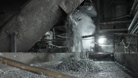 Recycling plastic by dissolving in a metal container. A large amount of crushed Stock Footage 168092545