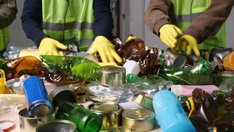 Recycling Sorting Center. Waste sorting belt. Hand separation of waste Stock Footage 242055249
