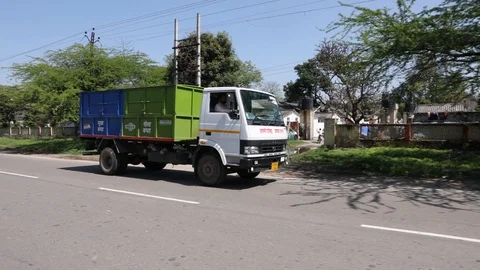 Recycling Wet and solid waste trash truck picking up truck Stock Footage 128123622