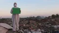 Recycling worker hold green screen  4k or 4k+ Resolution