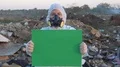 Recycling worker hold green table  4k or 4k+ Resolution