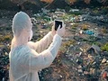 Recycling worker with tablet on the landfill  4k or 4k+ Resolution