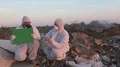 Recycling workers hold green screen and tablet  4k or 4k+ Resolution