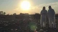 Recycling workers researching on the landfill  4k or 4k+ Resolution