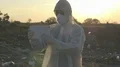 Recycling workers with tablet on the landfill  4k or 4k+ Resolution