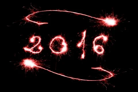 Red 2016 written with Sparkle firework Stock Photos