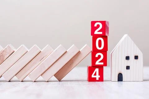 Red 2024 cube blocks stop falling blocks protect house miniature. fall Busi.. Stock Photos