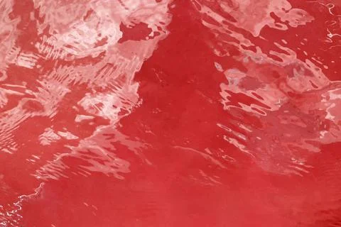 Red abstract background liquid movement concept glossy surface Stock Photos