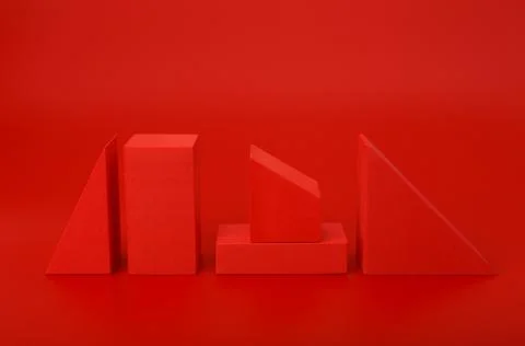 Red abstract background with red geometric figures against red background Stock Photos