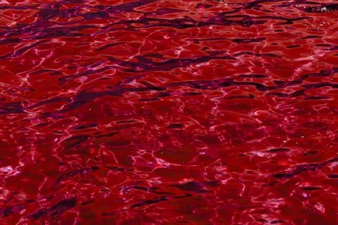 Red abstract background of water surface Stock Photos