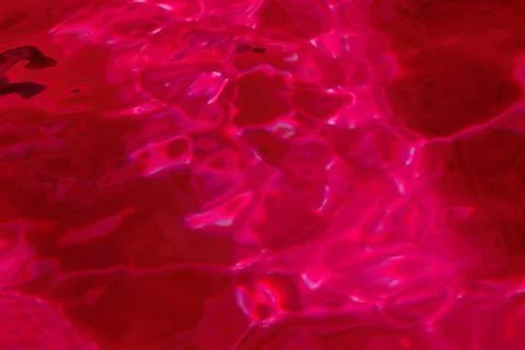 Red abstract background of water surface Stock Photos
