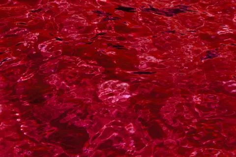 Red abstract background of water surface Stock Photos