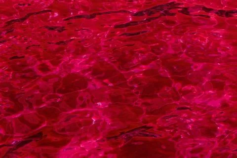 Red abstract background of water surface Stock Photos